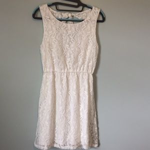 White lace sun dress; features open back (Medium)